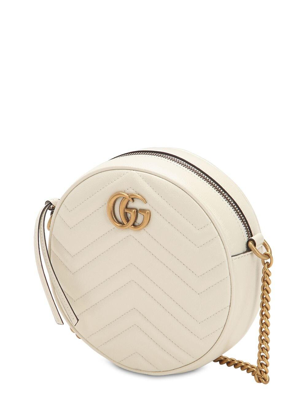 white circle gucci purse