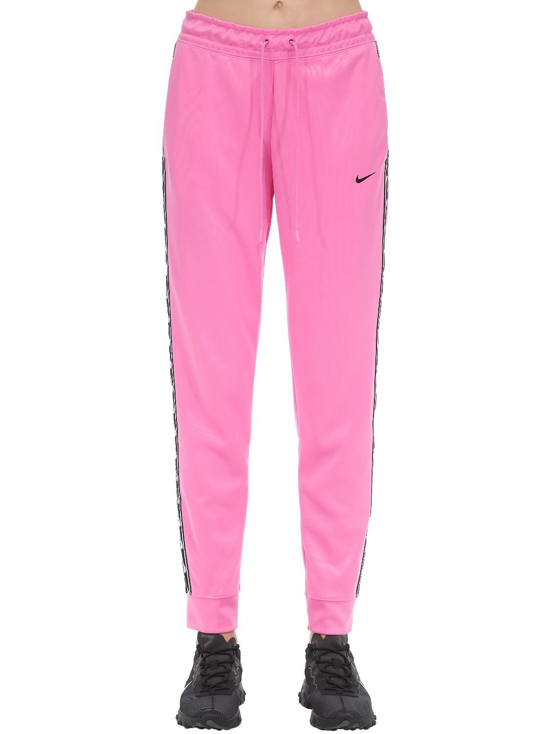 Nike Jogger Logo Tape Sweatpants in Pink | Lyst
