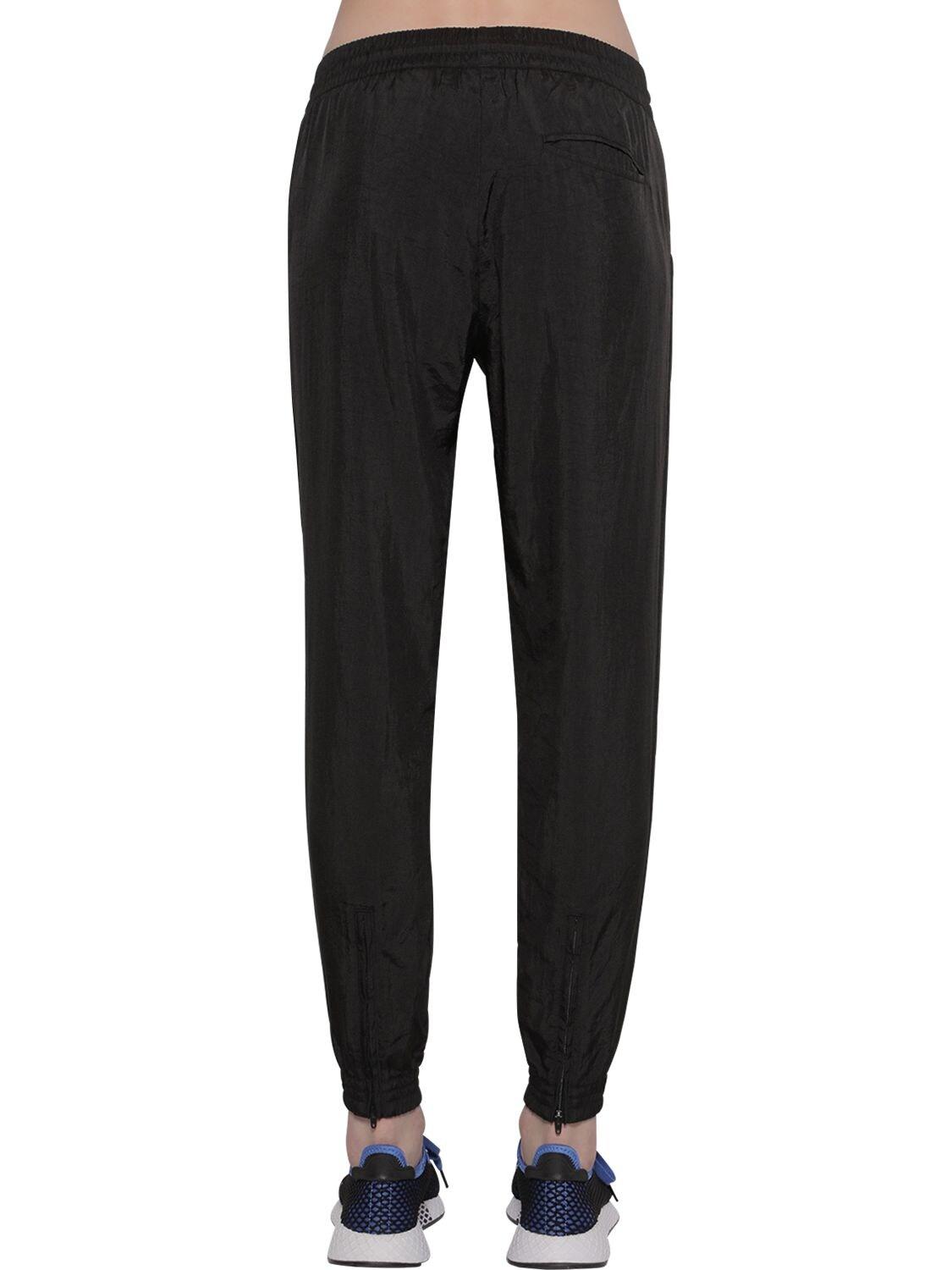 synthetic track pants