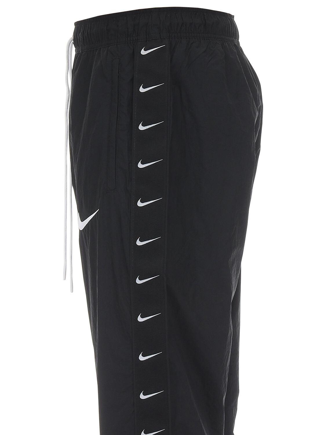 Nike Nsw Swoosh Woven Nylon Pants in Black for Men | Lyst