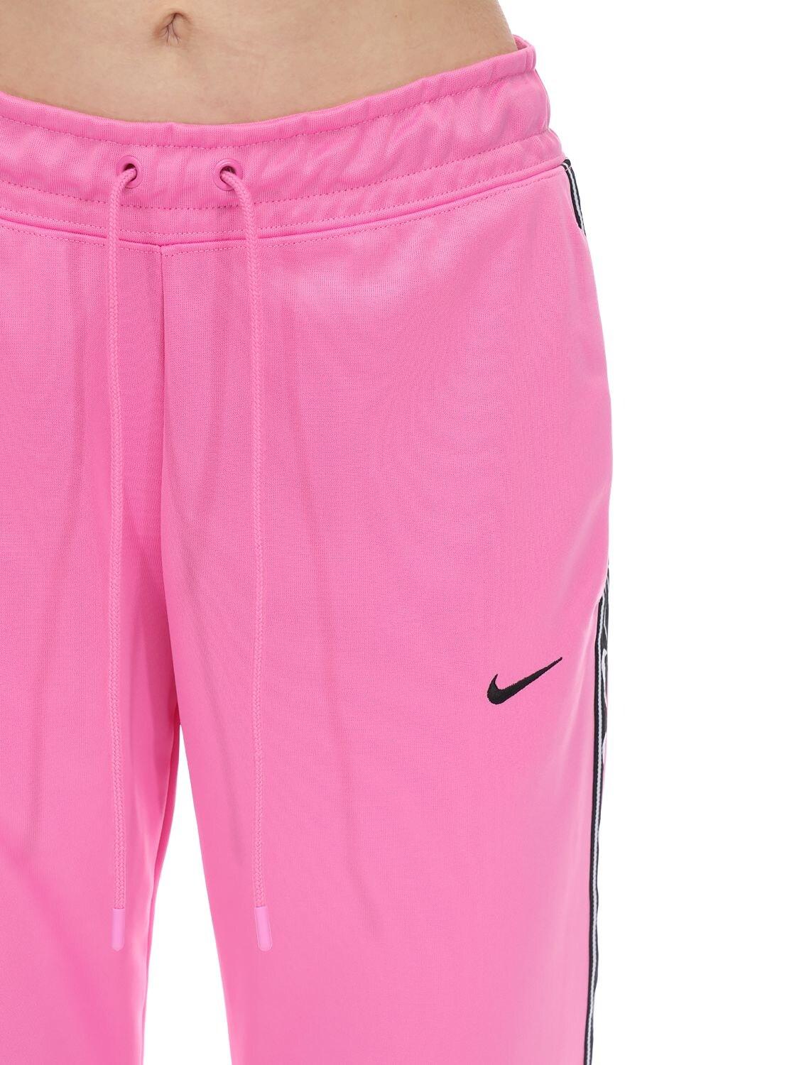 Nike Jogger Logo Tape Sweatpants in Pink | Lyst