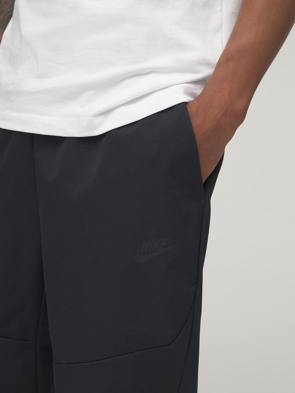 Nike Premium Essentials Woven Pants in Black for Men - Lyst