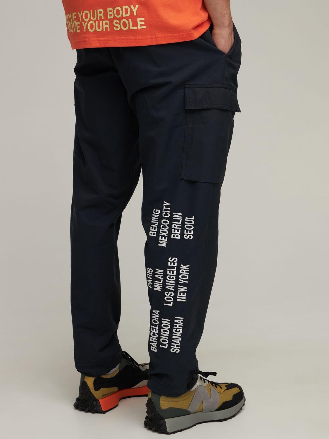Nike World Tour Woven Cargo Pants in Black for Men | Lyst UK