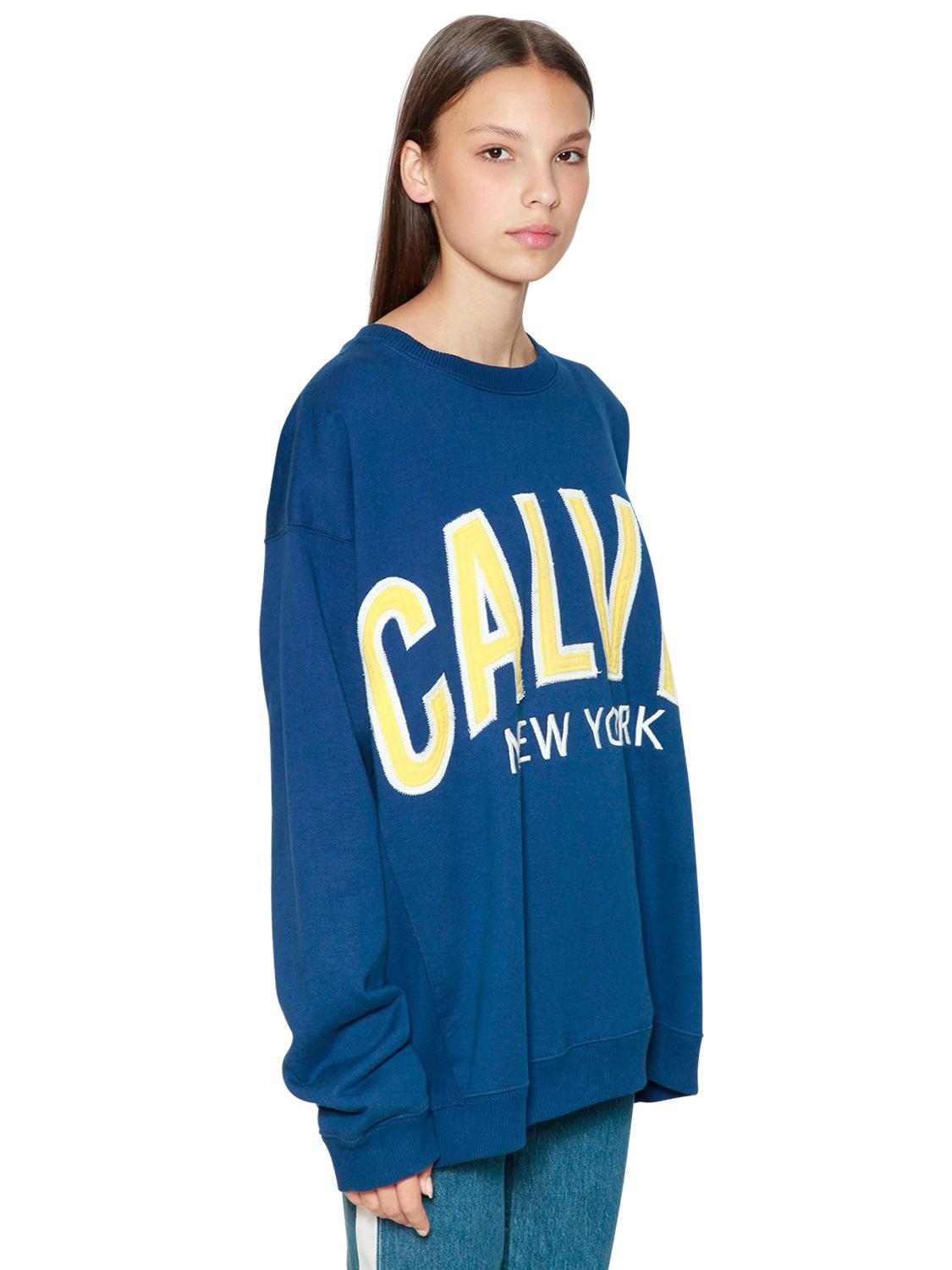 calvin klein yellow sweater