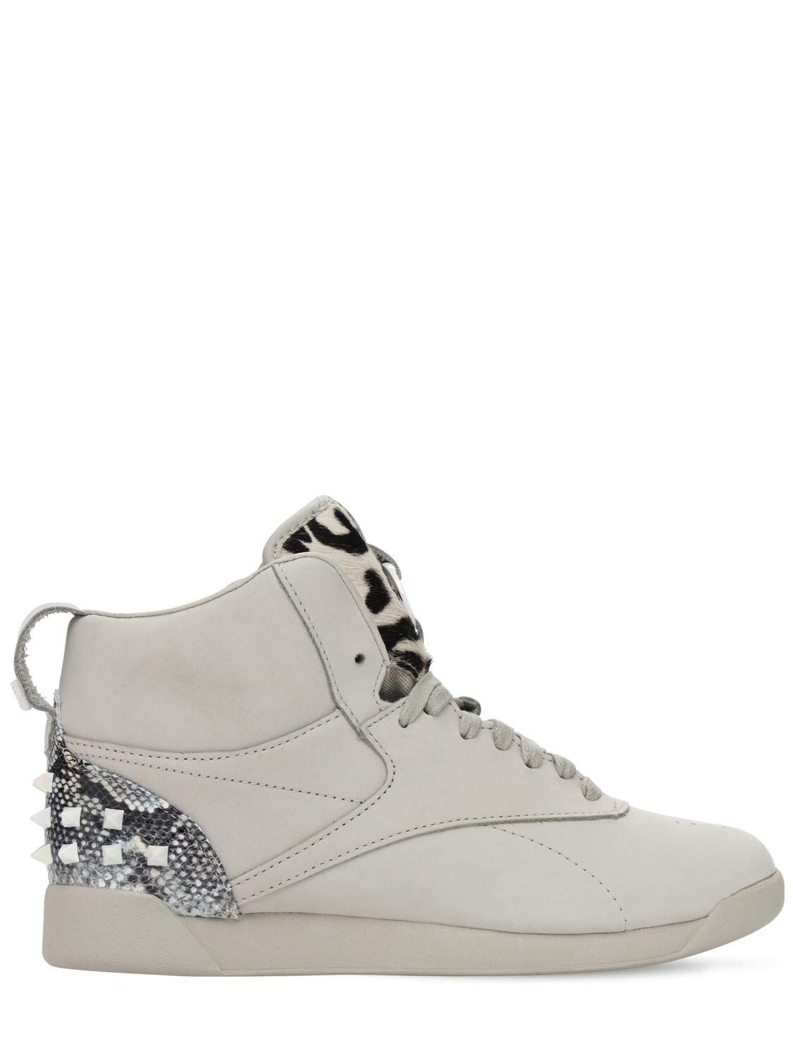 reebok freestyle wonder woman sneakers