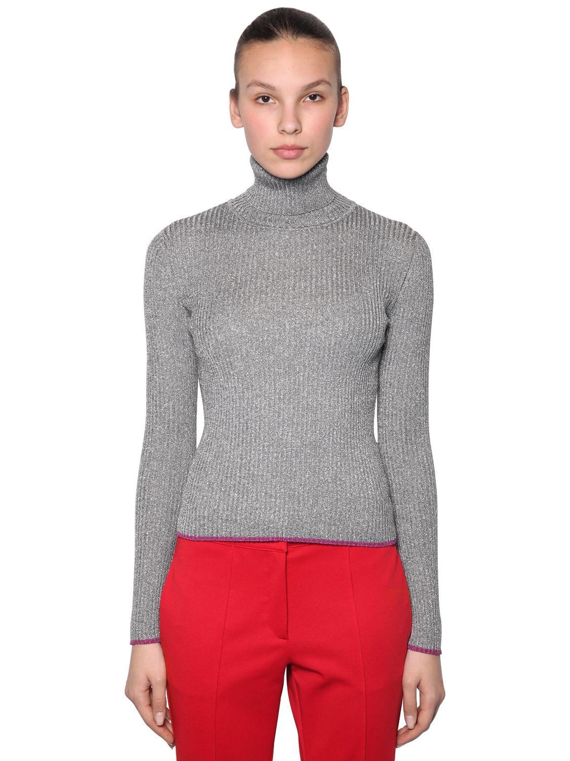 silver turtleneck sweater
