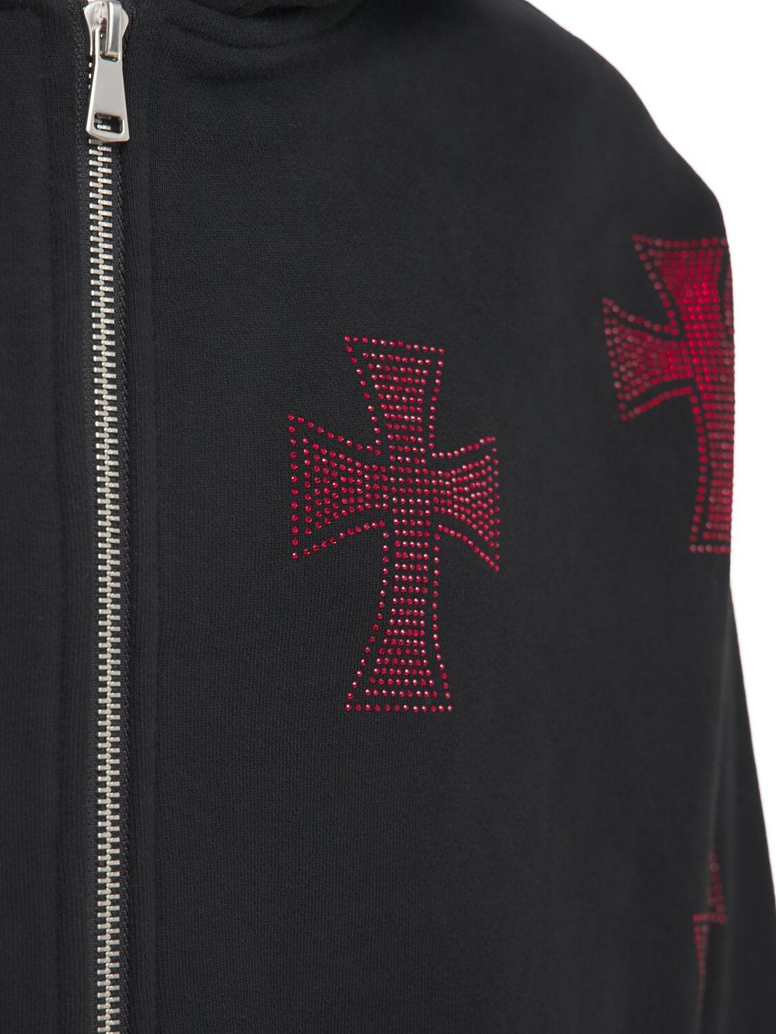 Black jumper with red clearance crosses