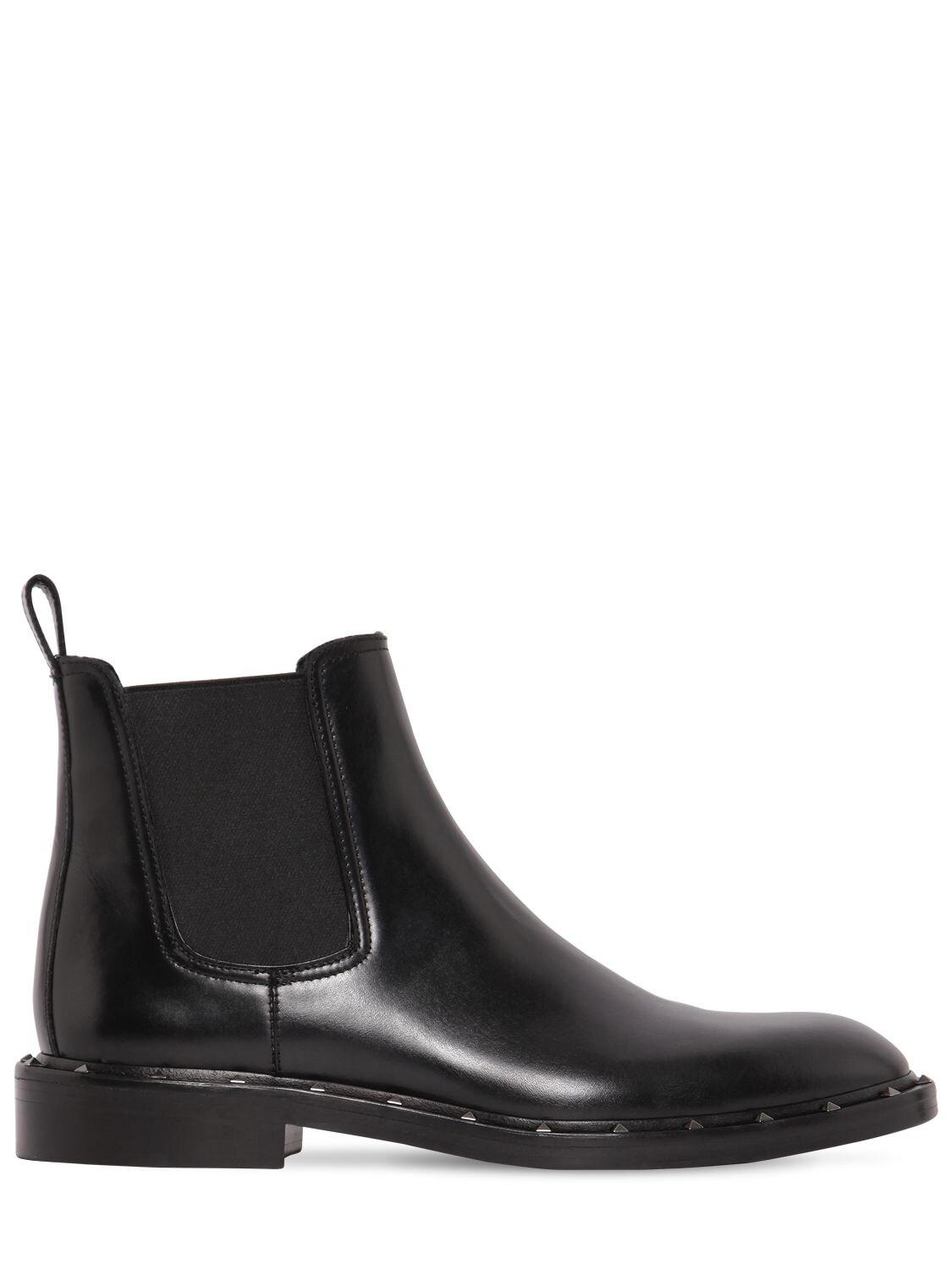 Valentino Sleek Studded Boots in Black for Men - Lyst