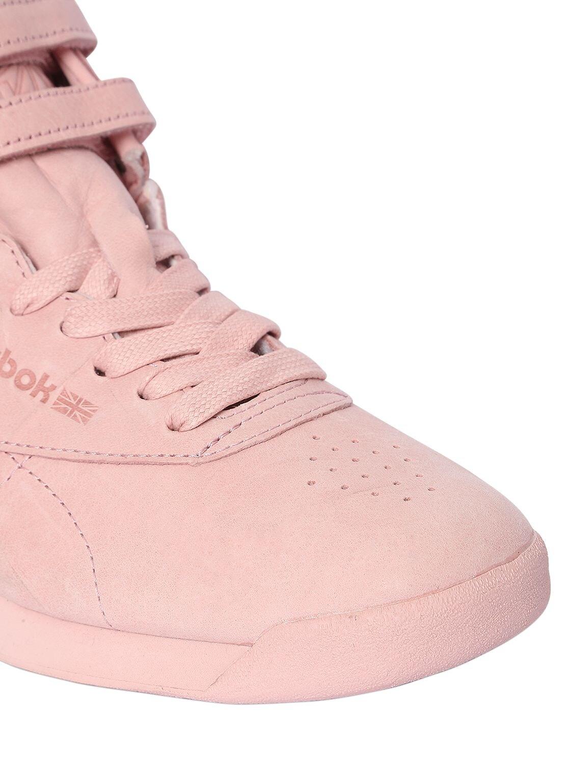 pink high top reeboks