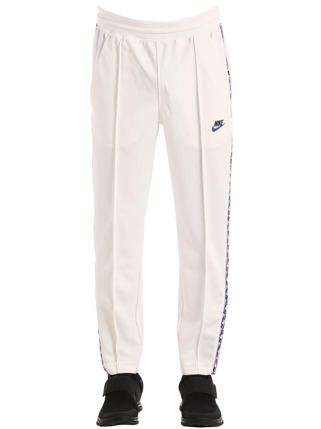 Pantalon De Survêtement Avec Bandes Latérales Nike pour homme en coloris  Blanc - Lyst