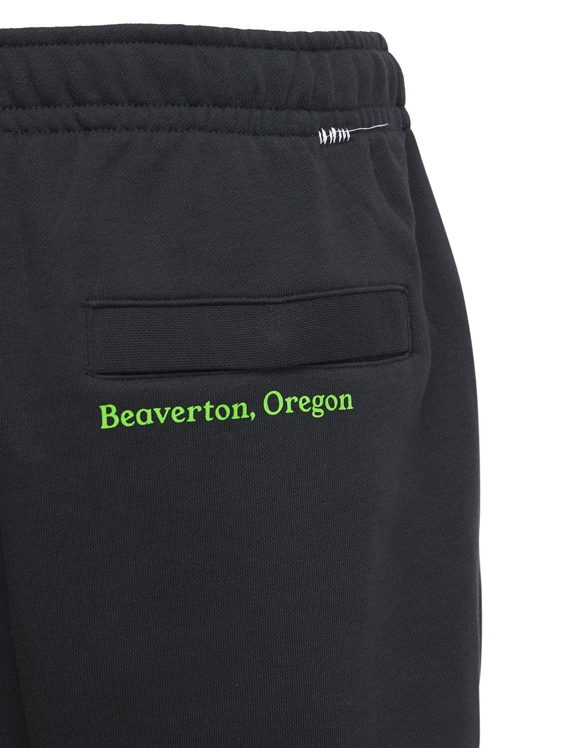 Nike World Tour Jogger Pants in Black 