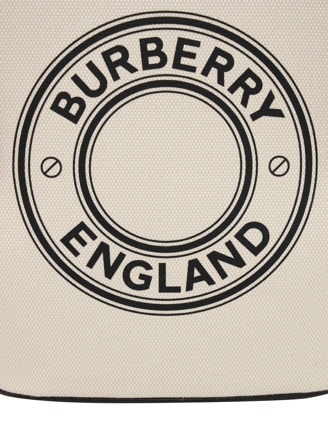 Burberry Small Peggy bucket bag in e-canvas with monogram Price