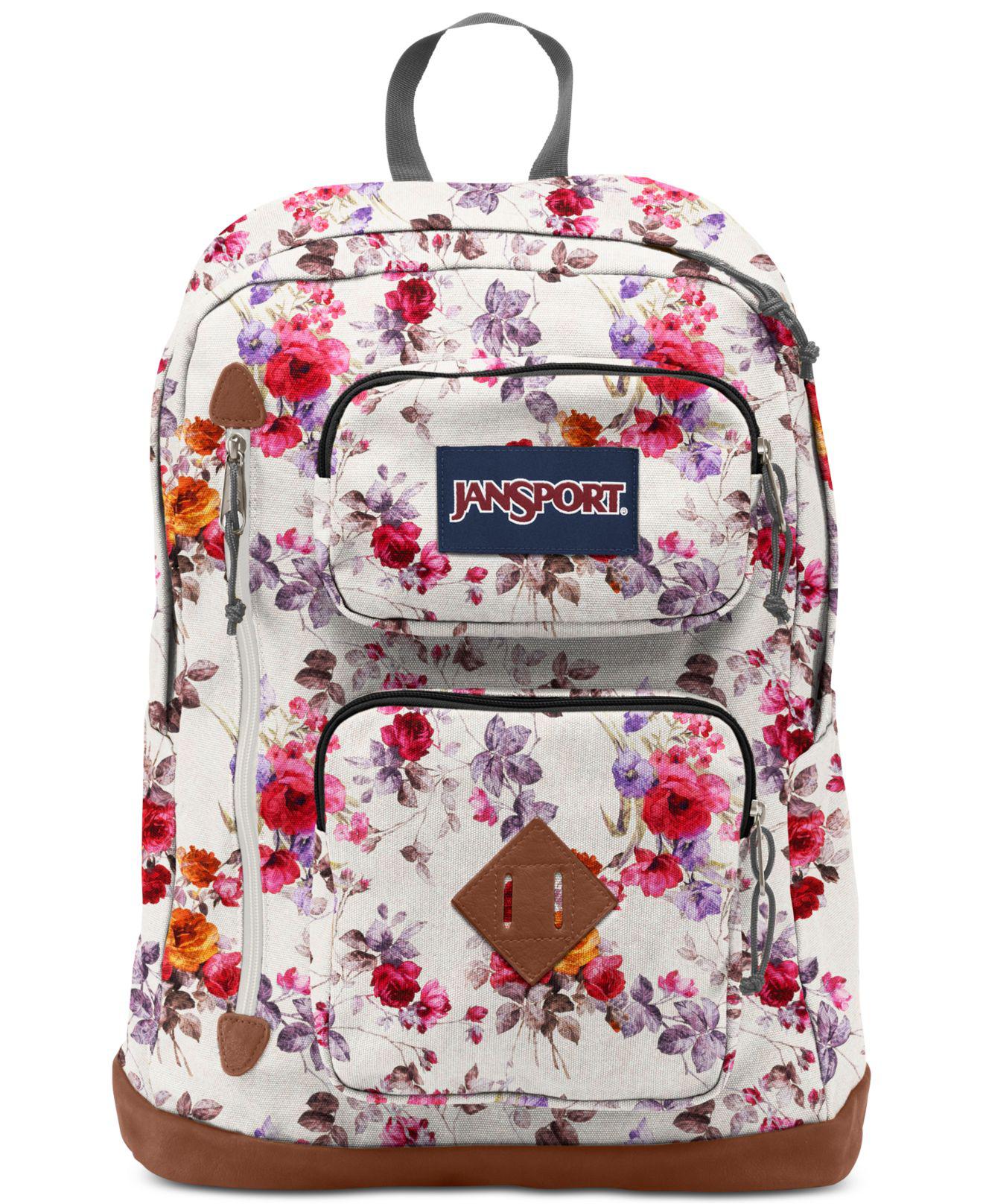 white floral jansport backpack