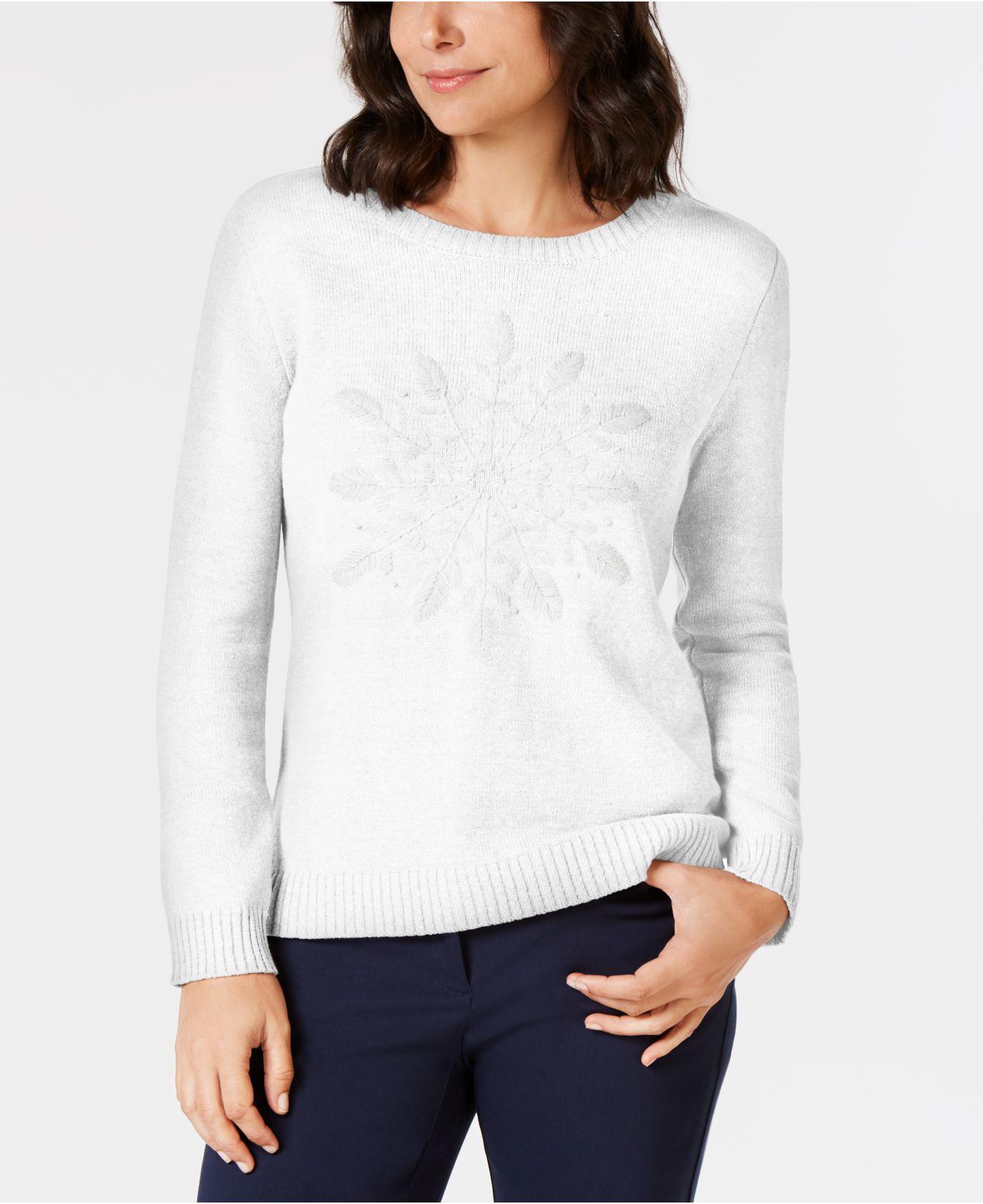 white snowflake sweater