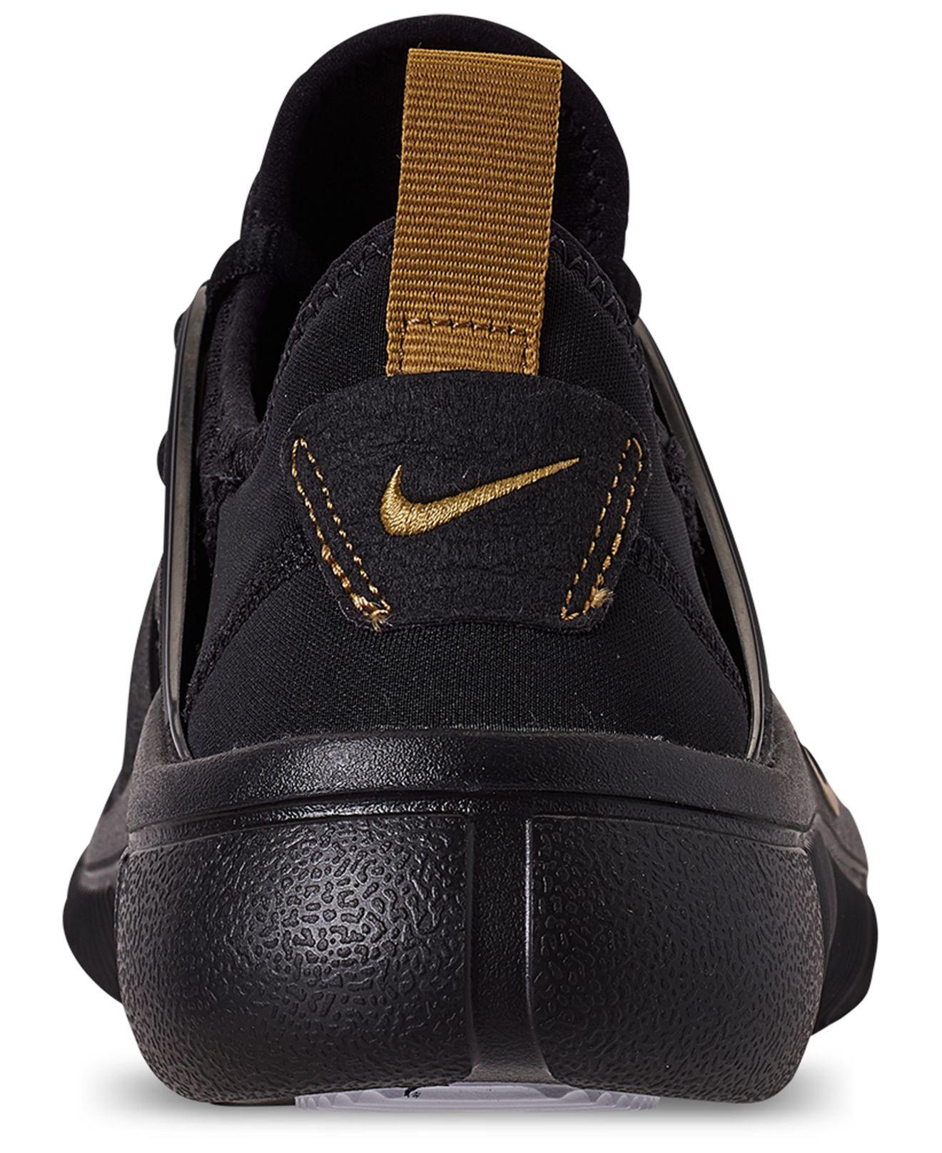 nike acalme black and gold