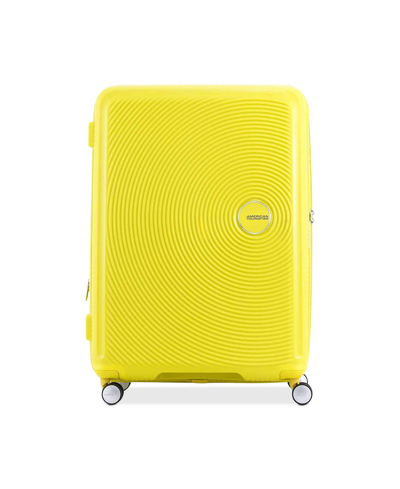 american tourister curio yellow