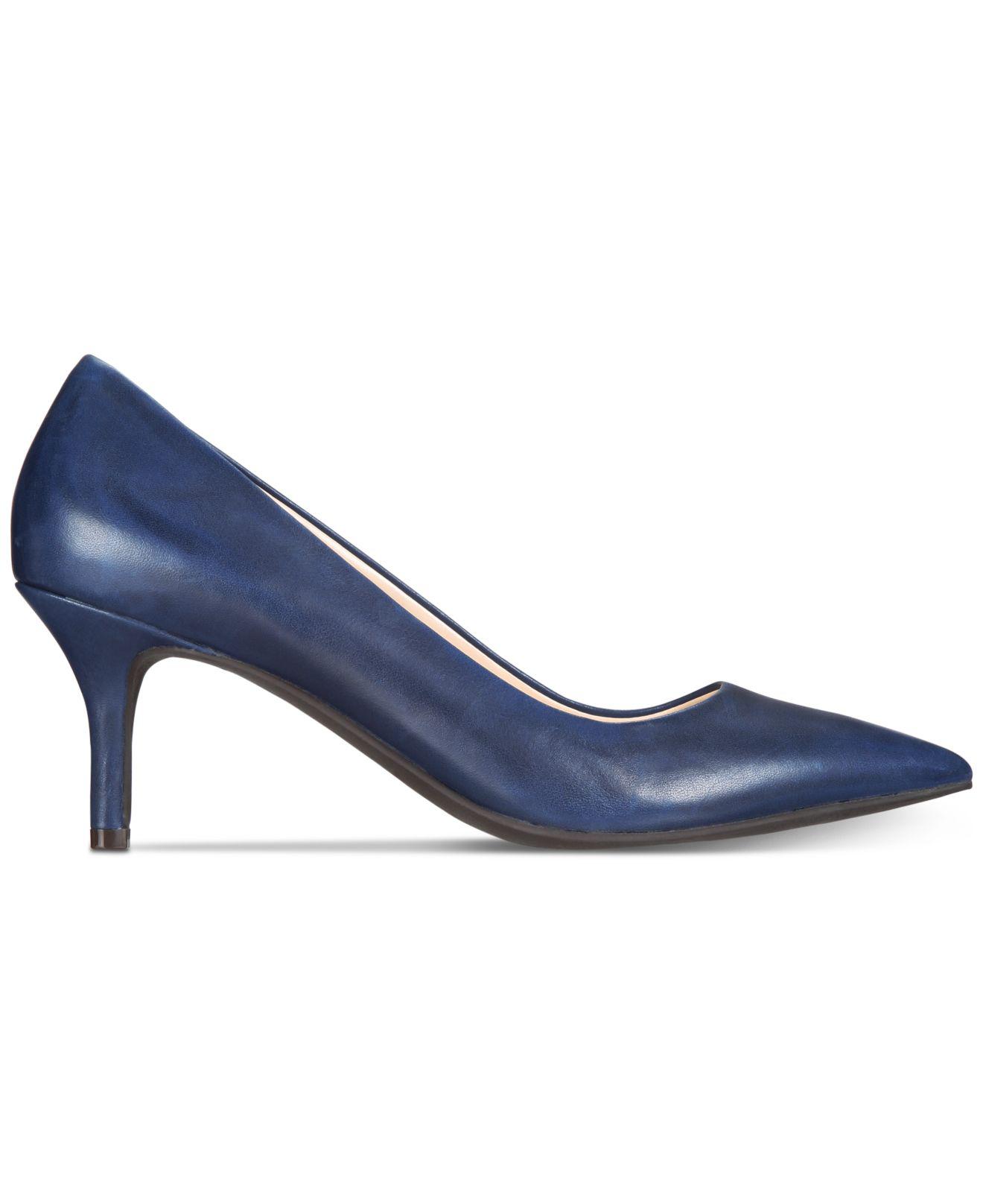 cole haan navy pumps