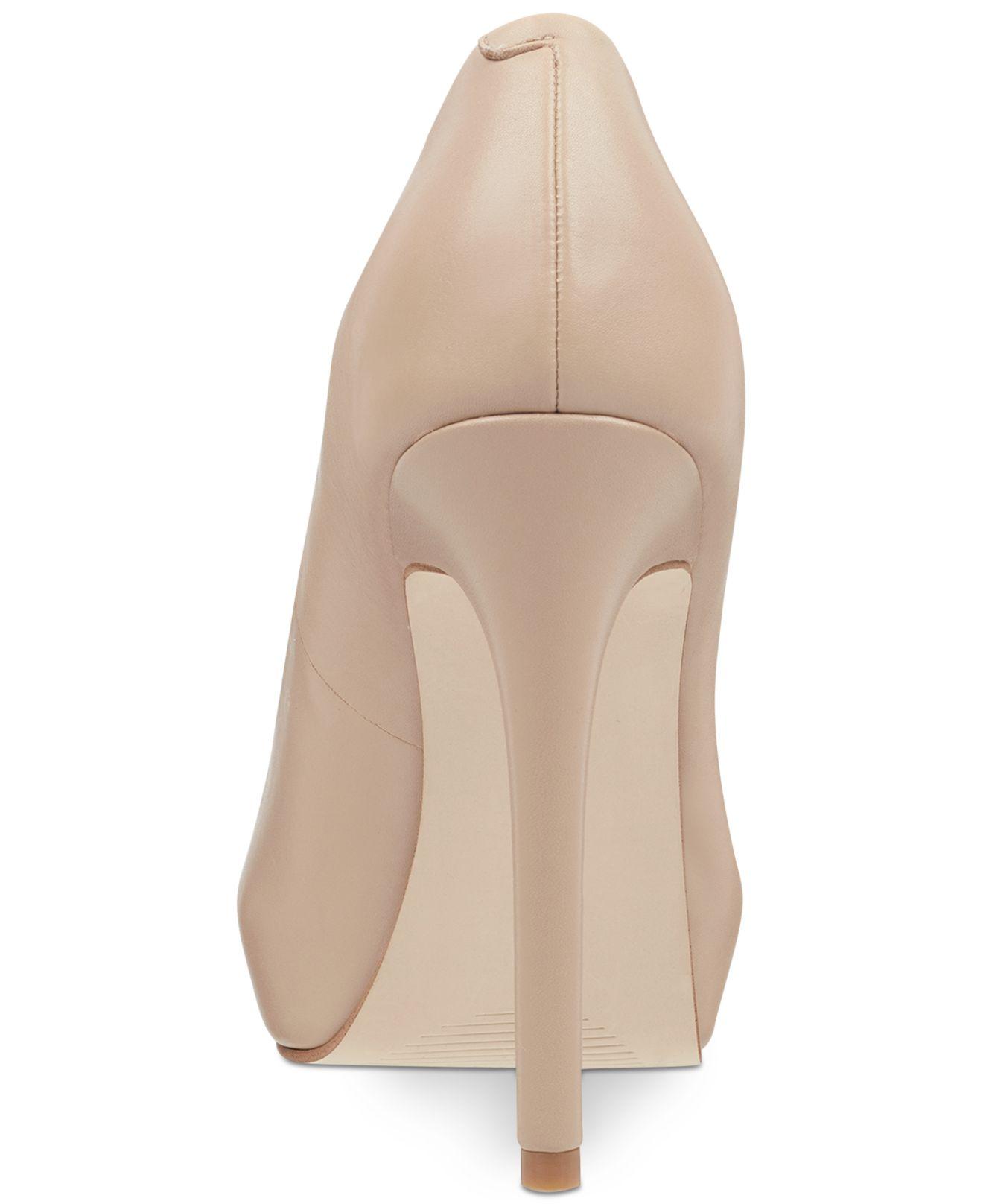 guess women's honora peep toe platform pumps