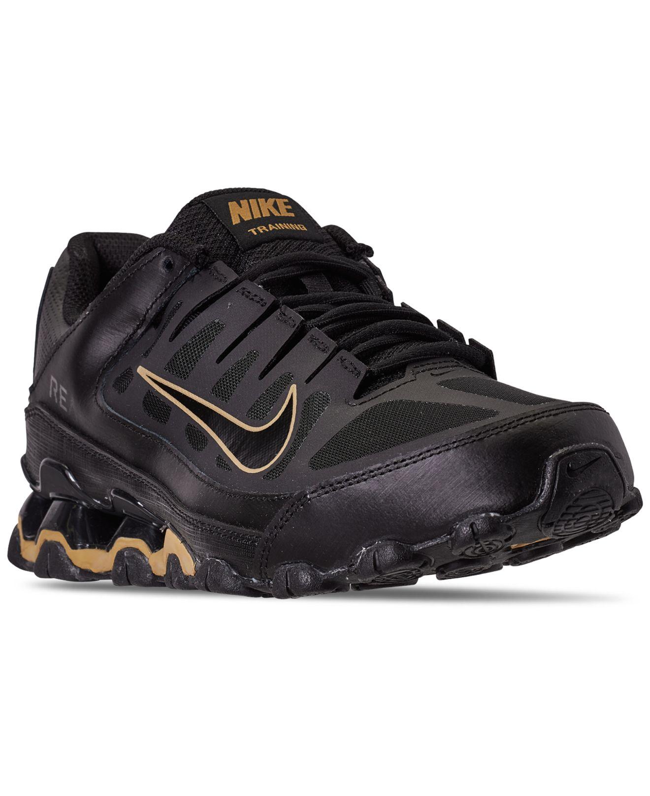 nike reax black and gold