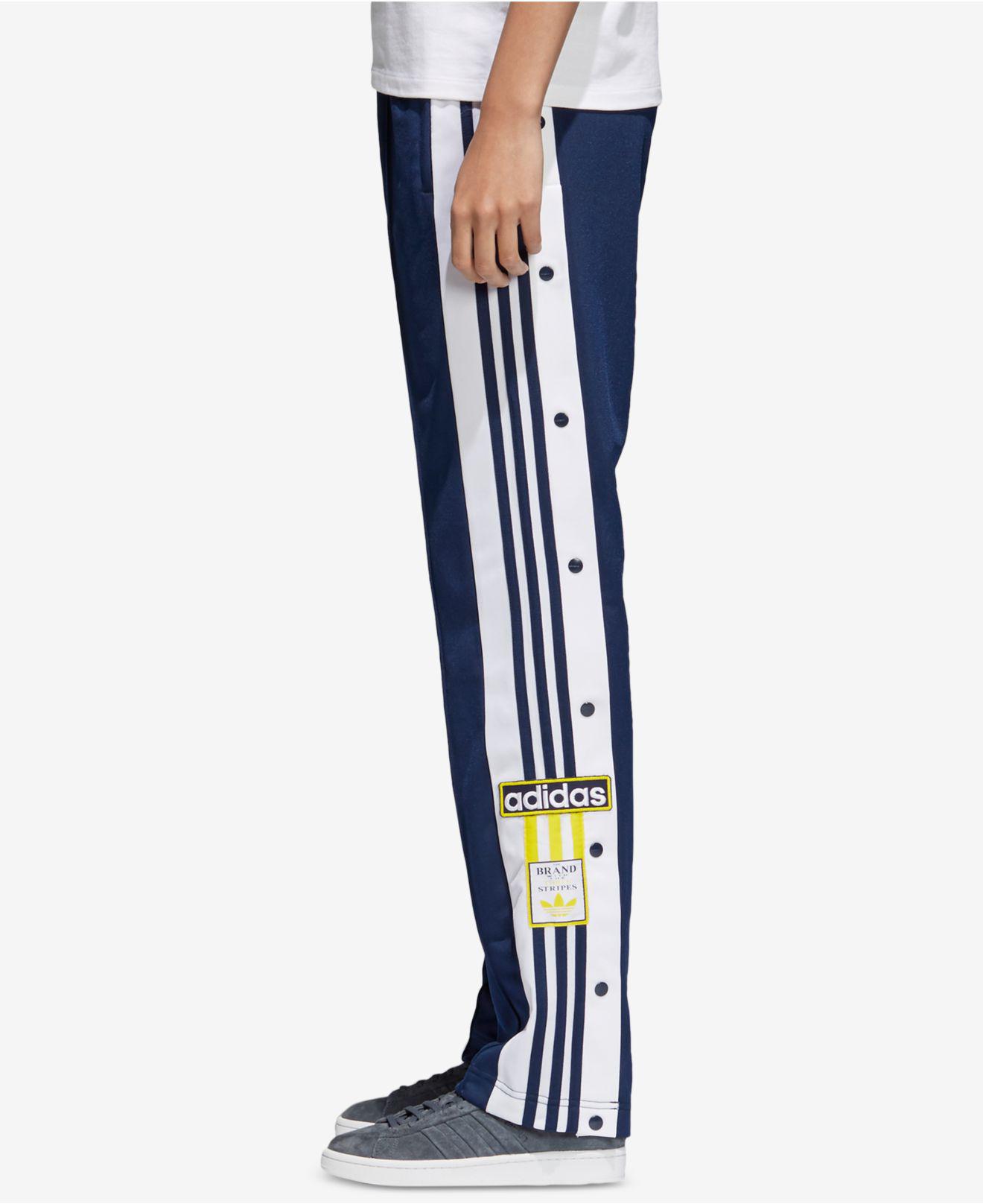 the brand with the three stripes sweatpants