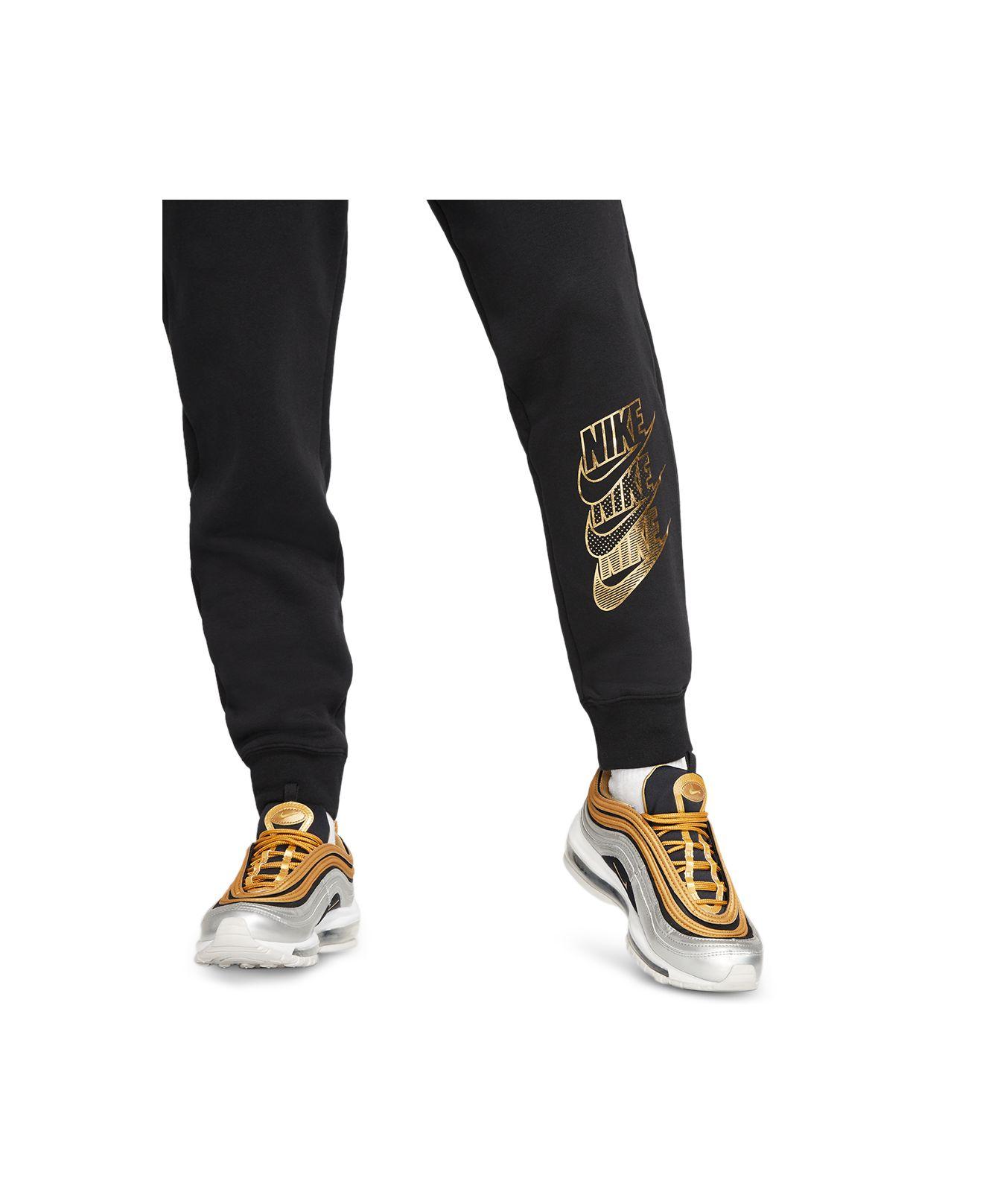 black and gold nike sweatsuit