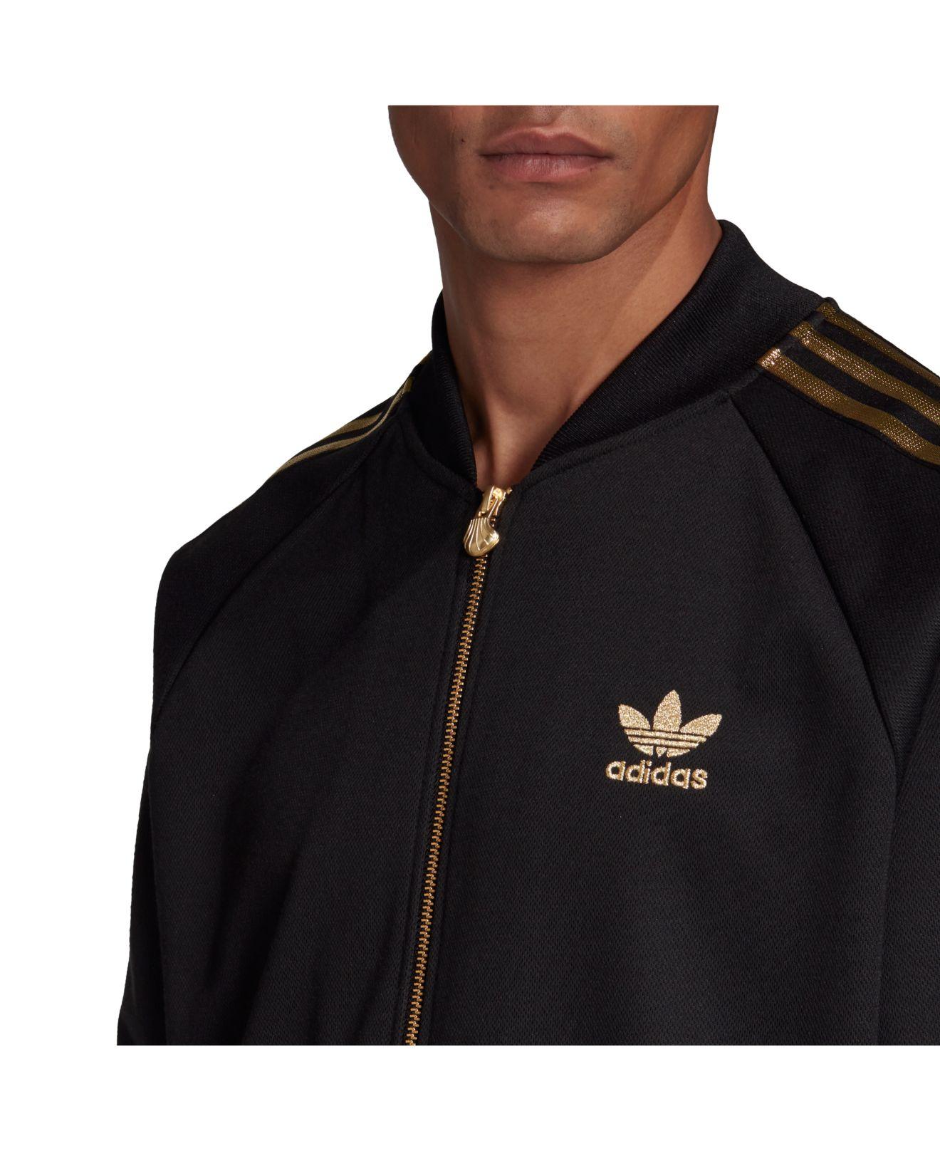 gold adidas track jacket