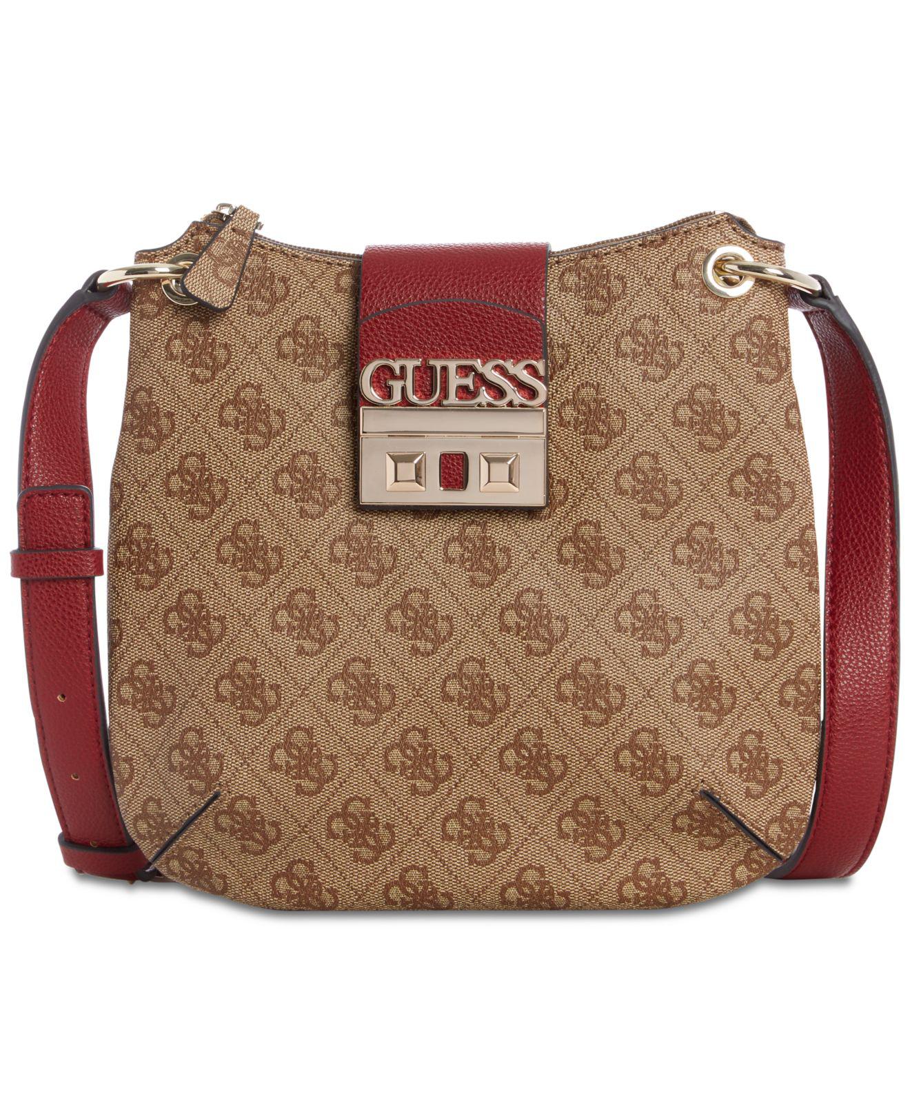 Guess Logo Luxe Tourist (brown) Handbags Lyst