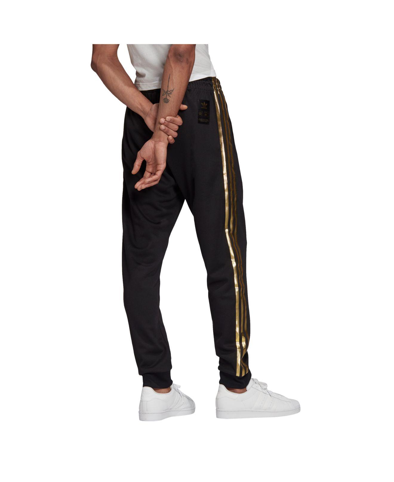 white and gold adidas joggers