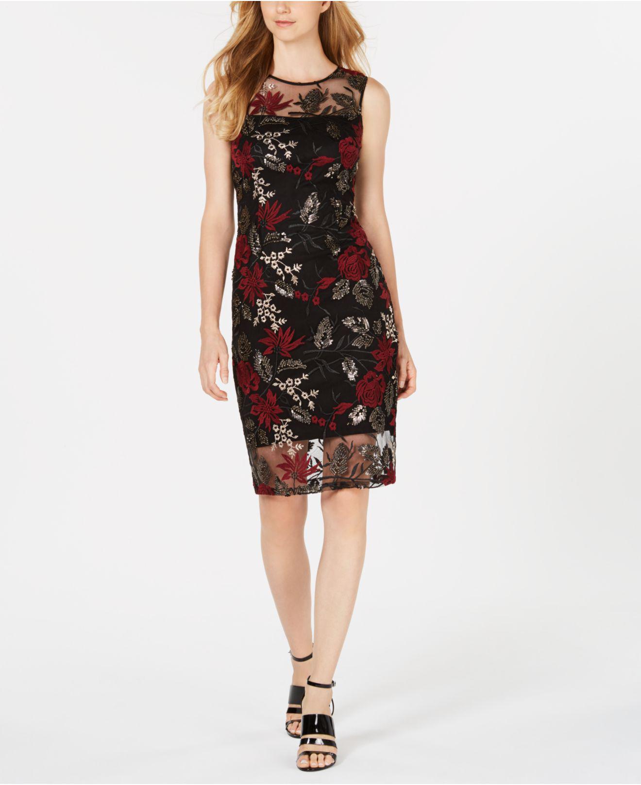 black dress with red embroidered flowers