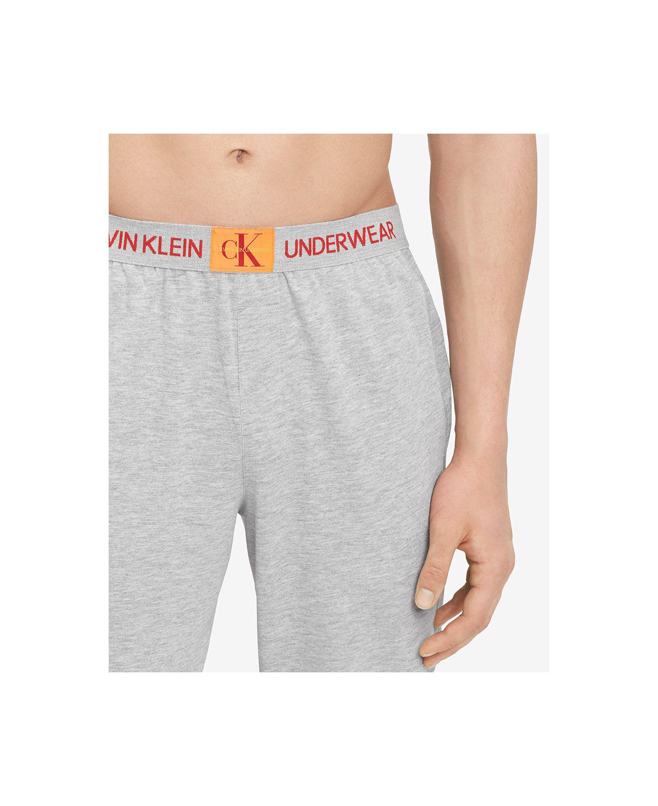 calvin klein grey and orange joggers