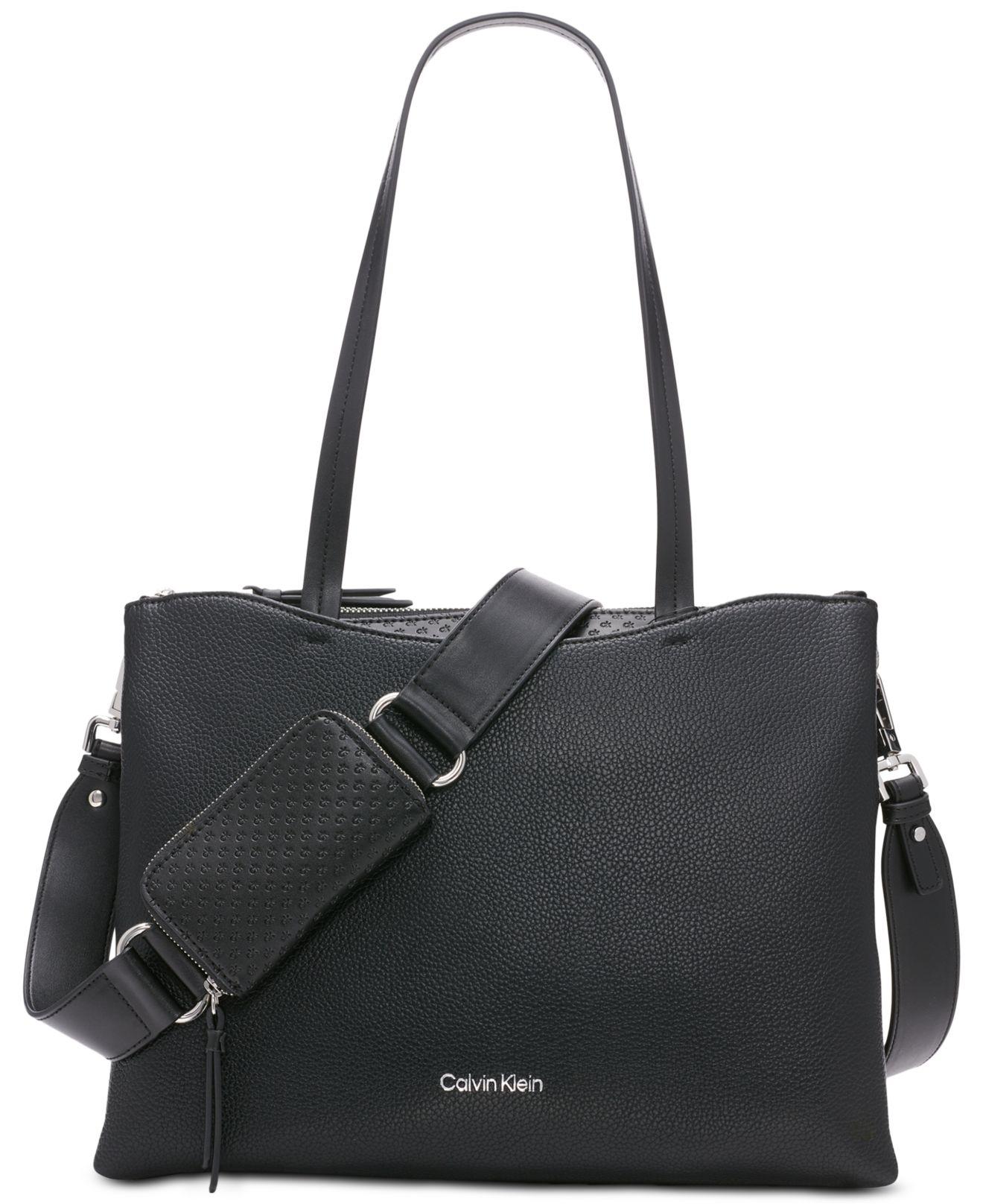 Calvin Klein Chrome Embossed Signature Top Zipper Convertible Tote in