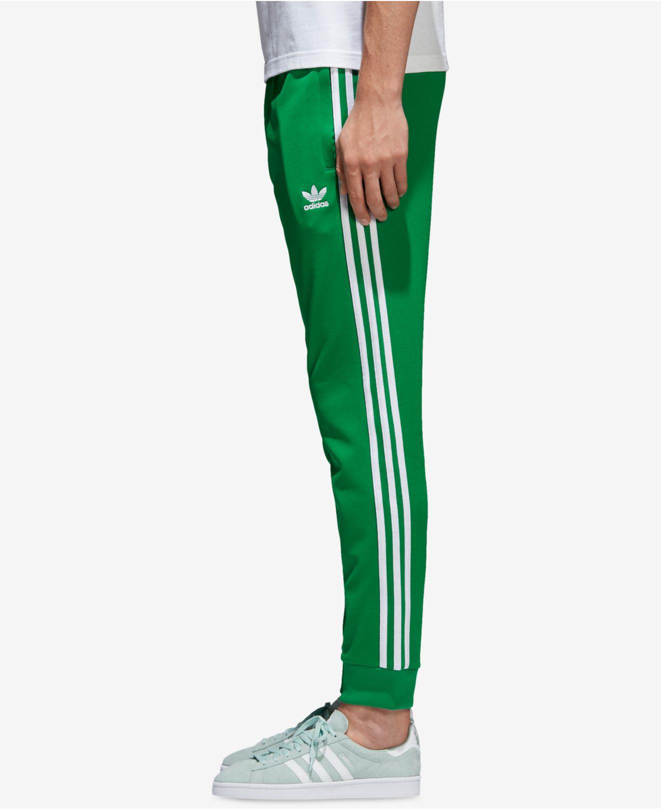 adidas sst track pants mens green