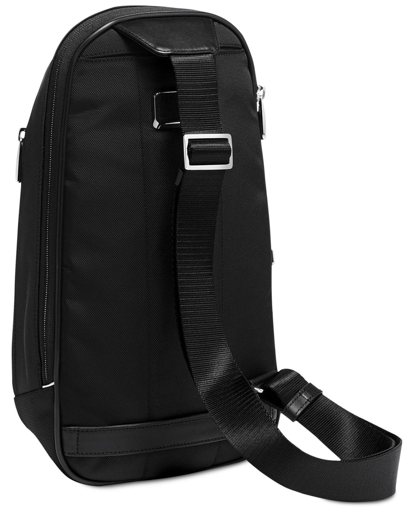 tumi leather sling bag