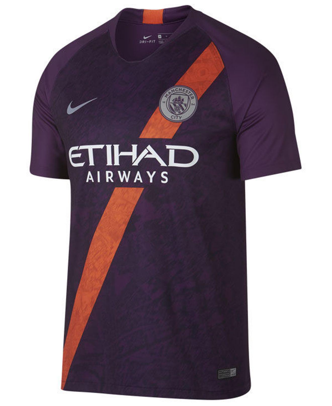 purple and orange nike shirt