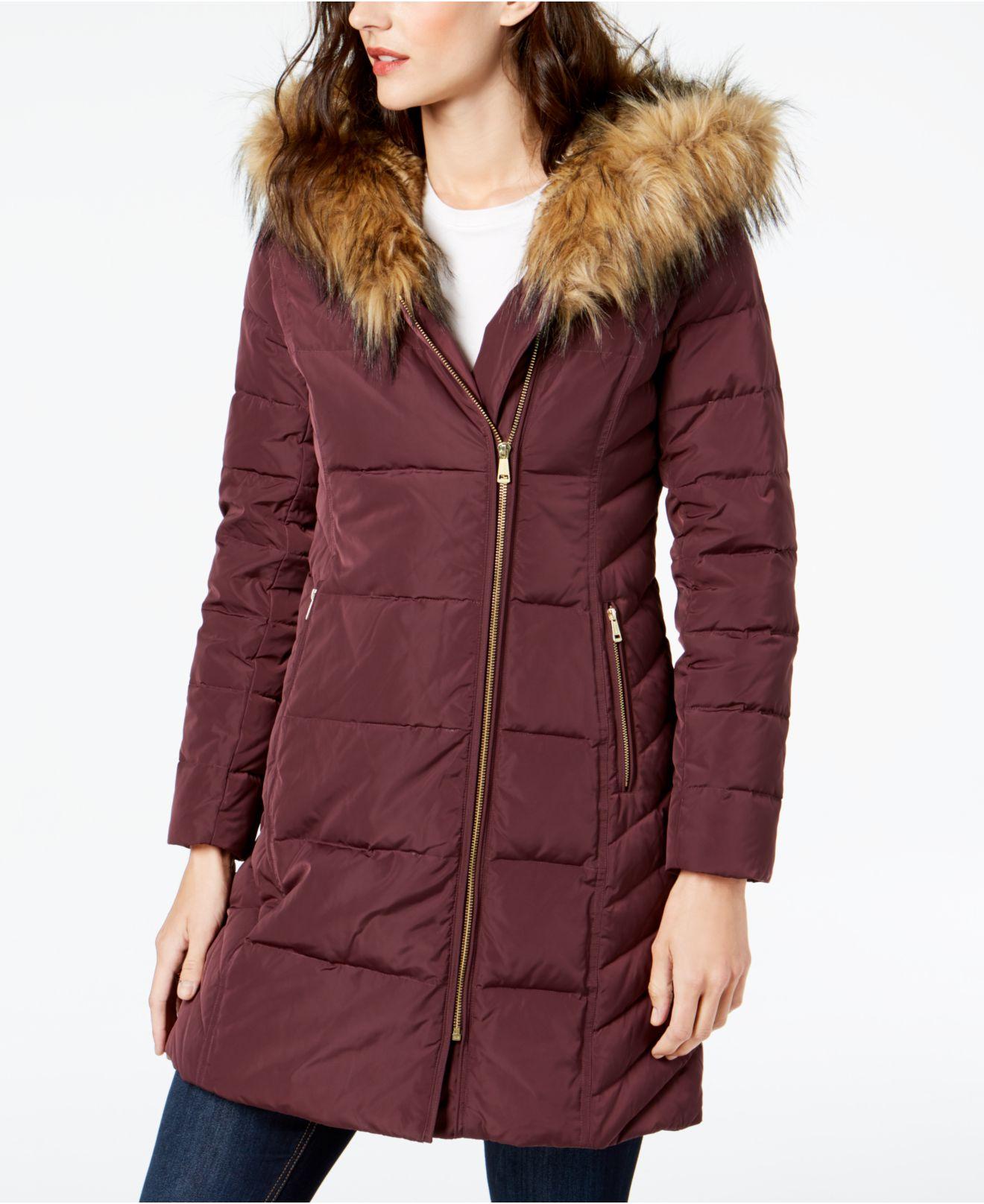 asymmetrical puffer coat with fur hood