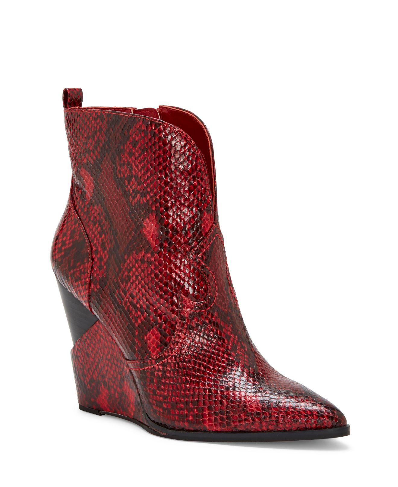 snakeskin wedge boots