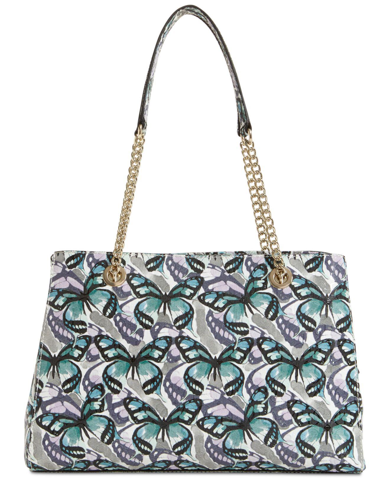 guess butterfly purse