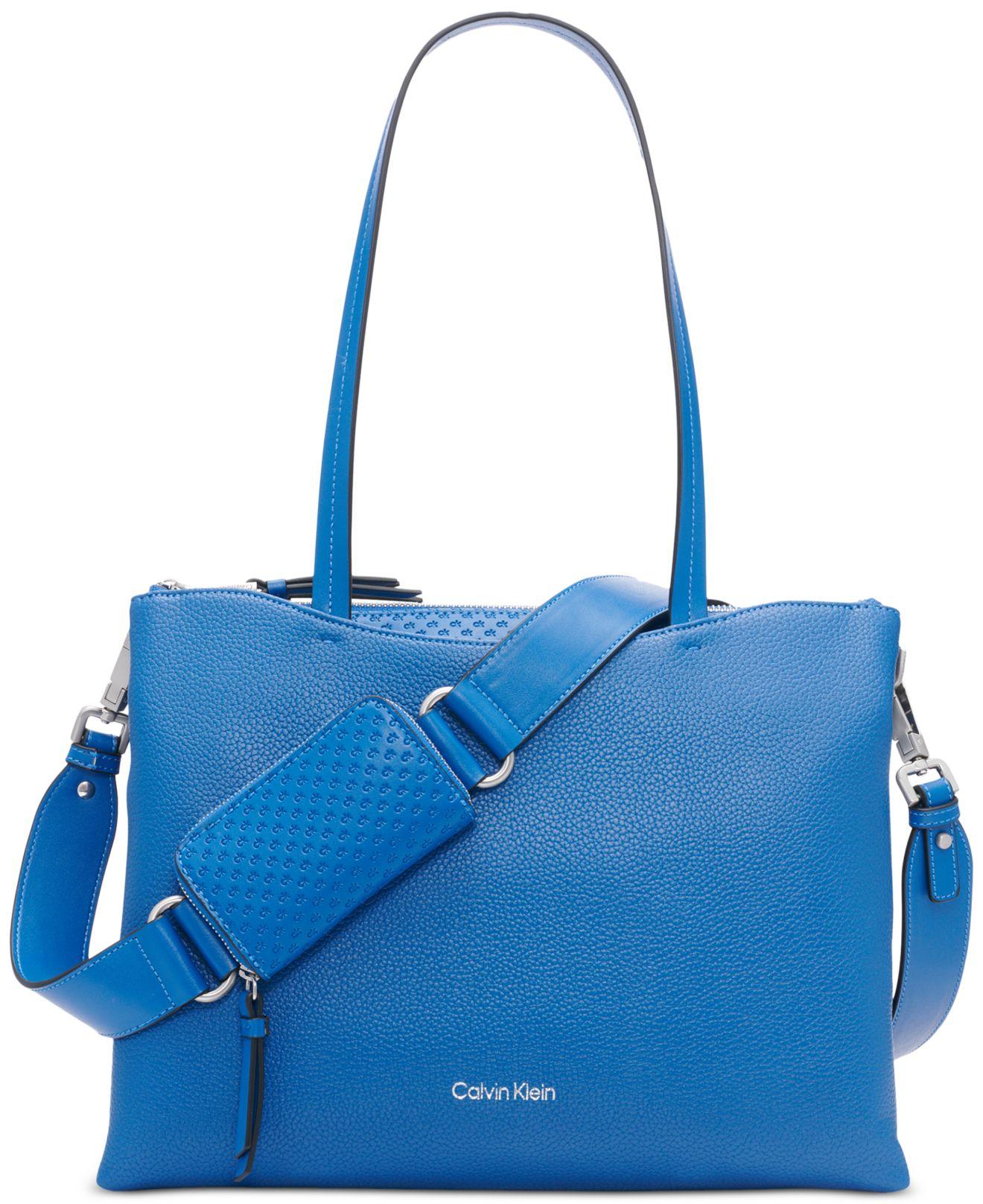 Calvin Klein Chrome Embossed Signature Top Zipper Convertible Tote in