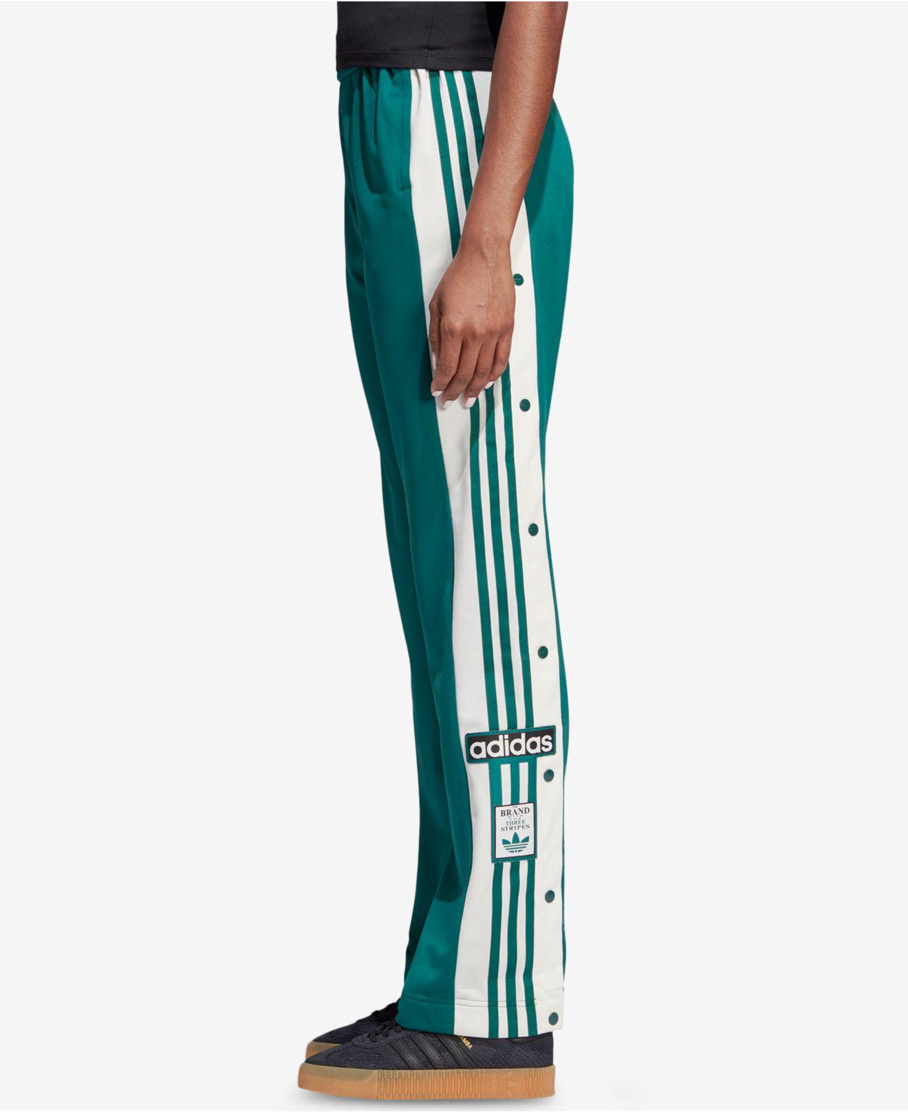the brand with the 3 stripes pants