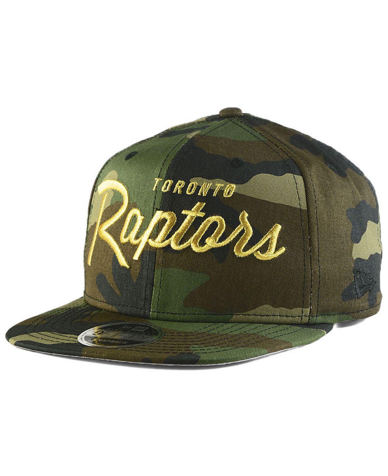 camo raptors hat