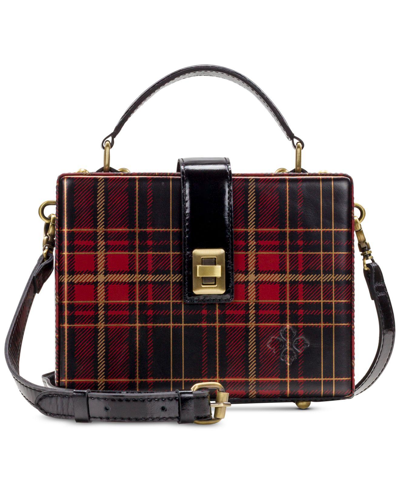 burgundy and gold clutch bag