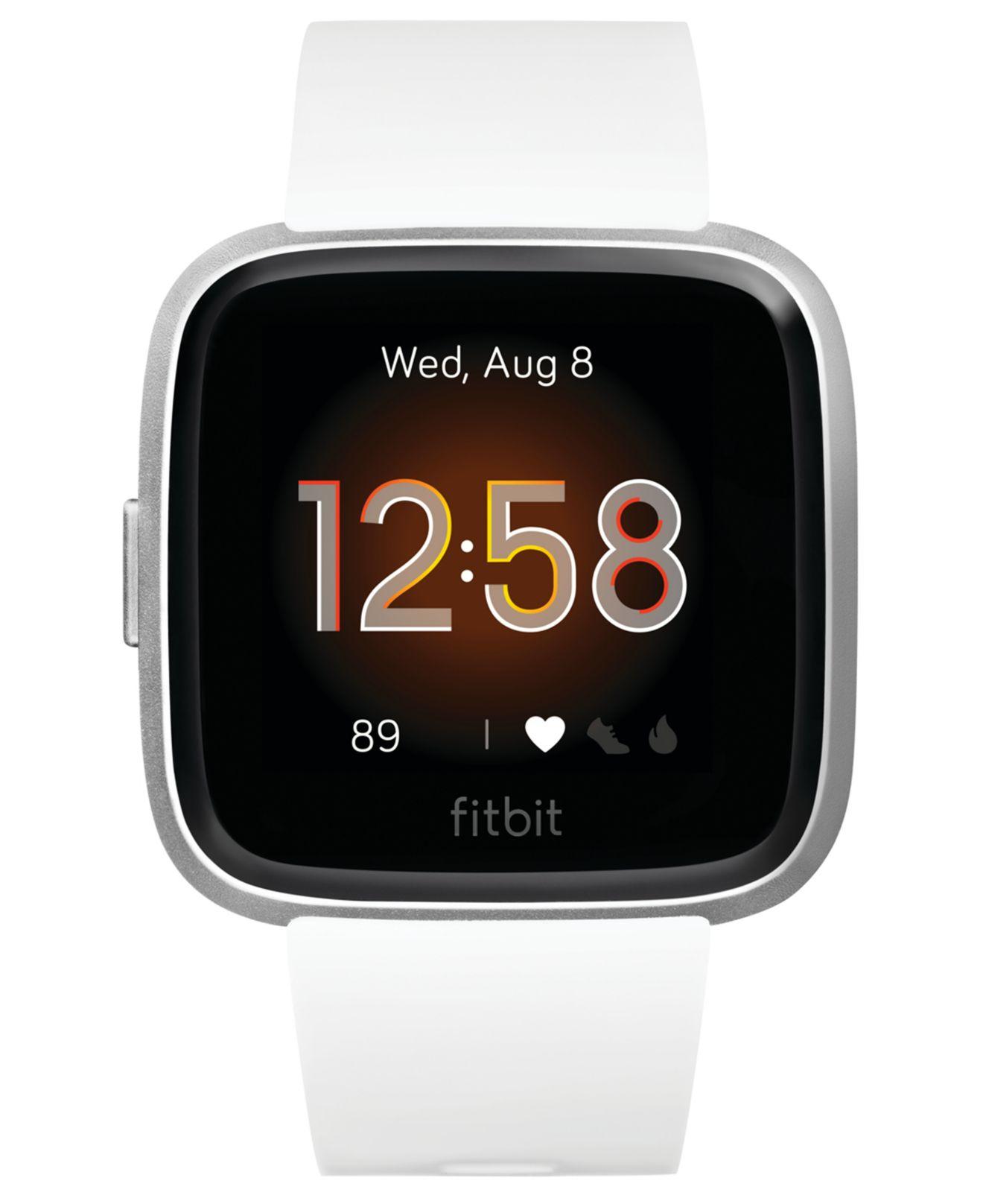 white fitbit watch