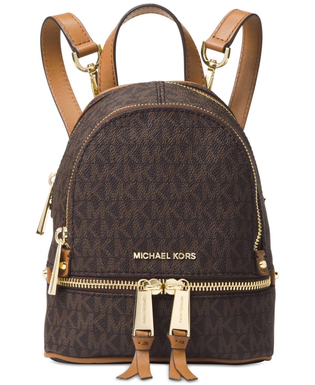Michael Kors Michael Logo Rhea Zip Extra Small Messenger Backpack in Brown