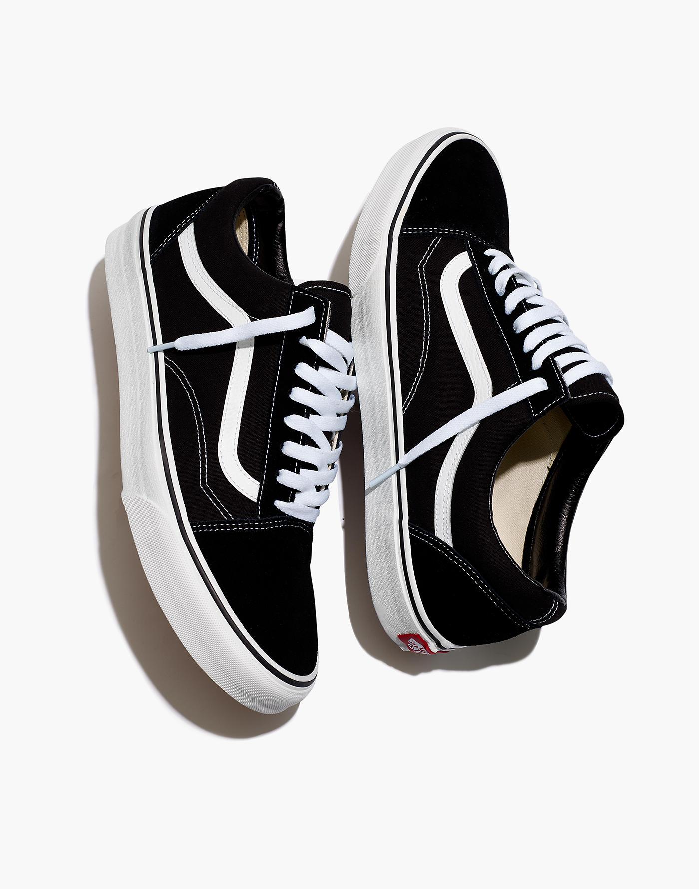 black old skool vans with black laces
