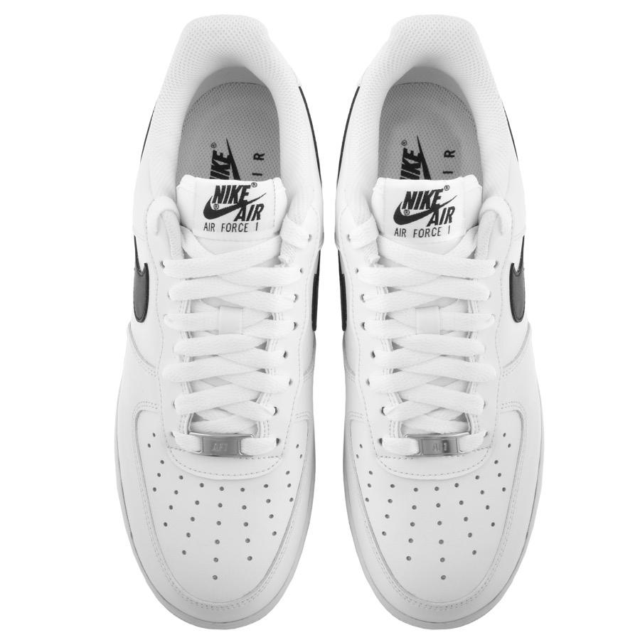 nike white trainers with black tick