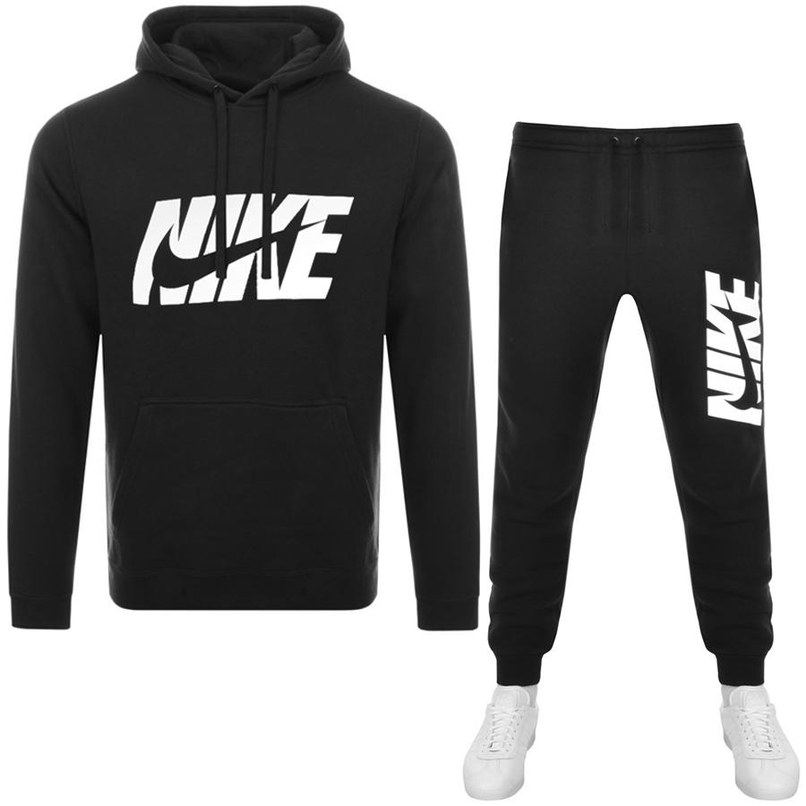 gray and black nike tracksuit