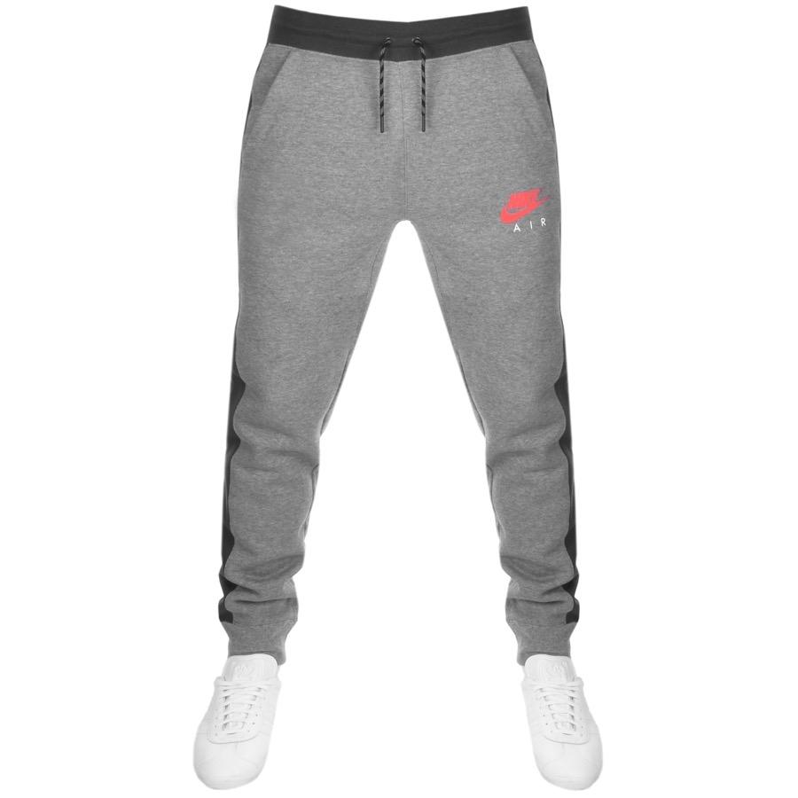 grey and pink nike tracksuit