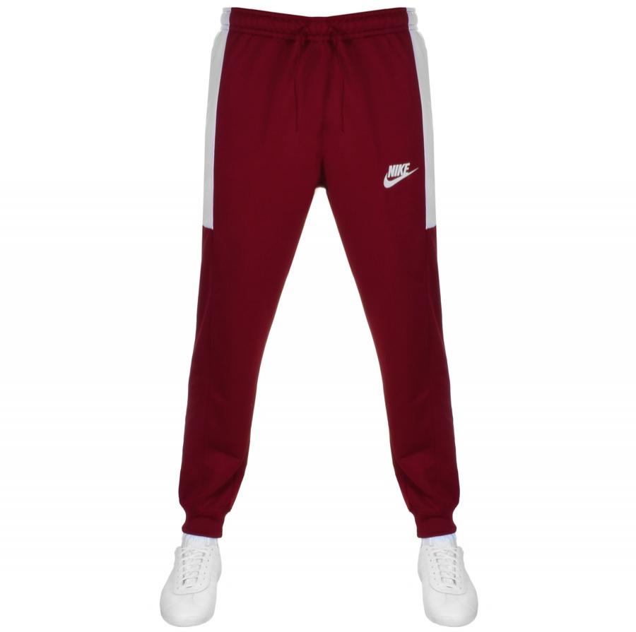 red nike trackies