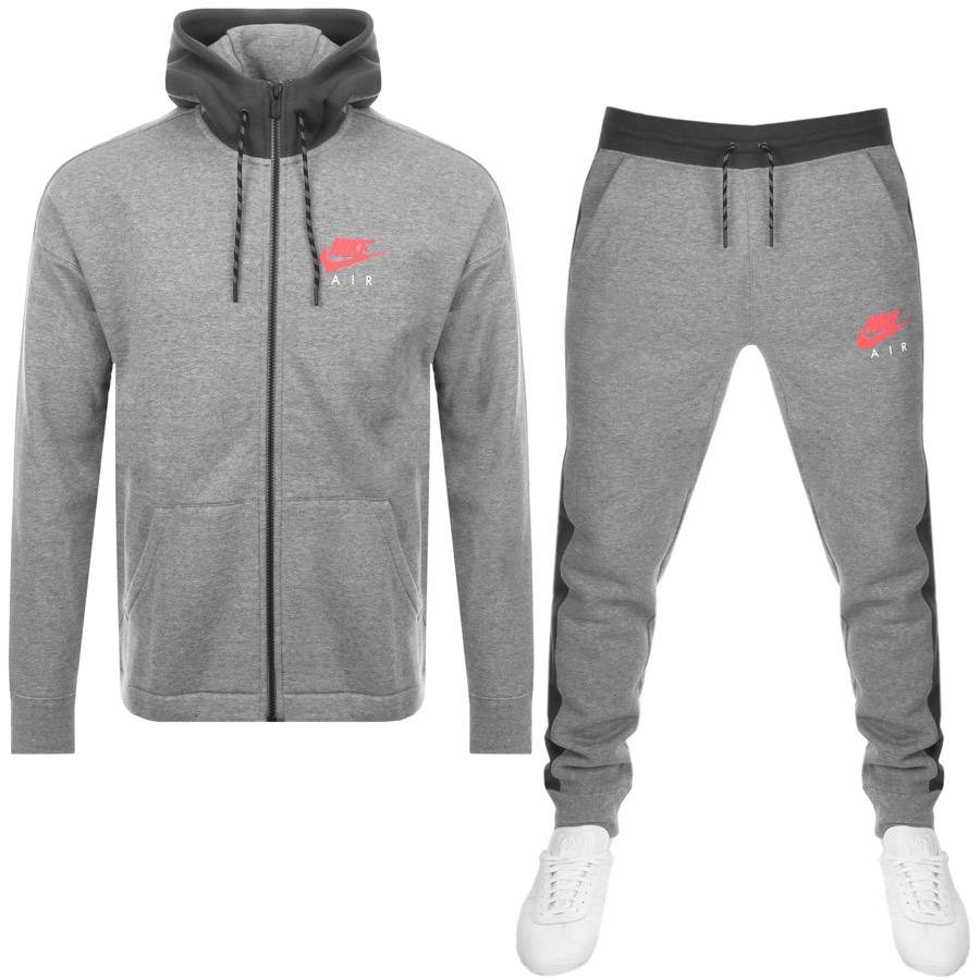 grey nike tracksuit with red tick