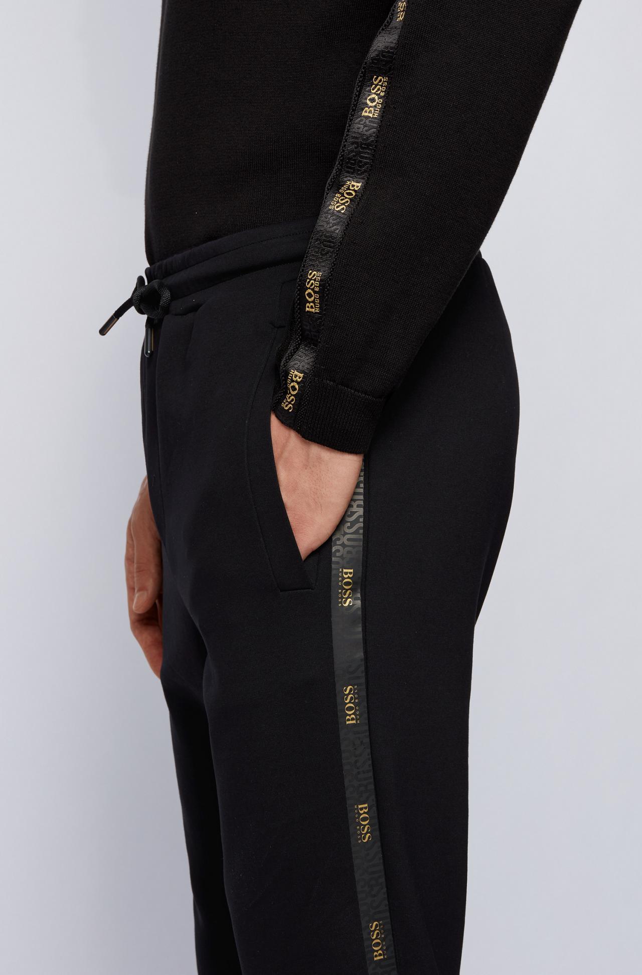 BOSS by HUGO BOSS Boss Gold Logo Side Stripe Sweat Pants in Black for Men |  Lyst